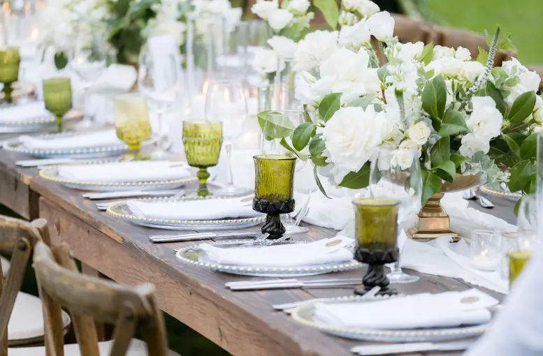 Table decorated for a wedding with flowers and cutlery