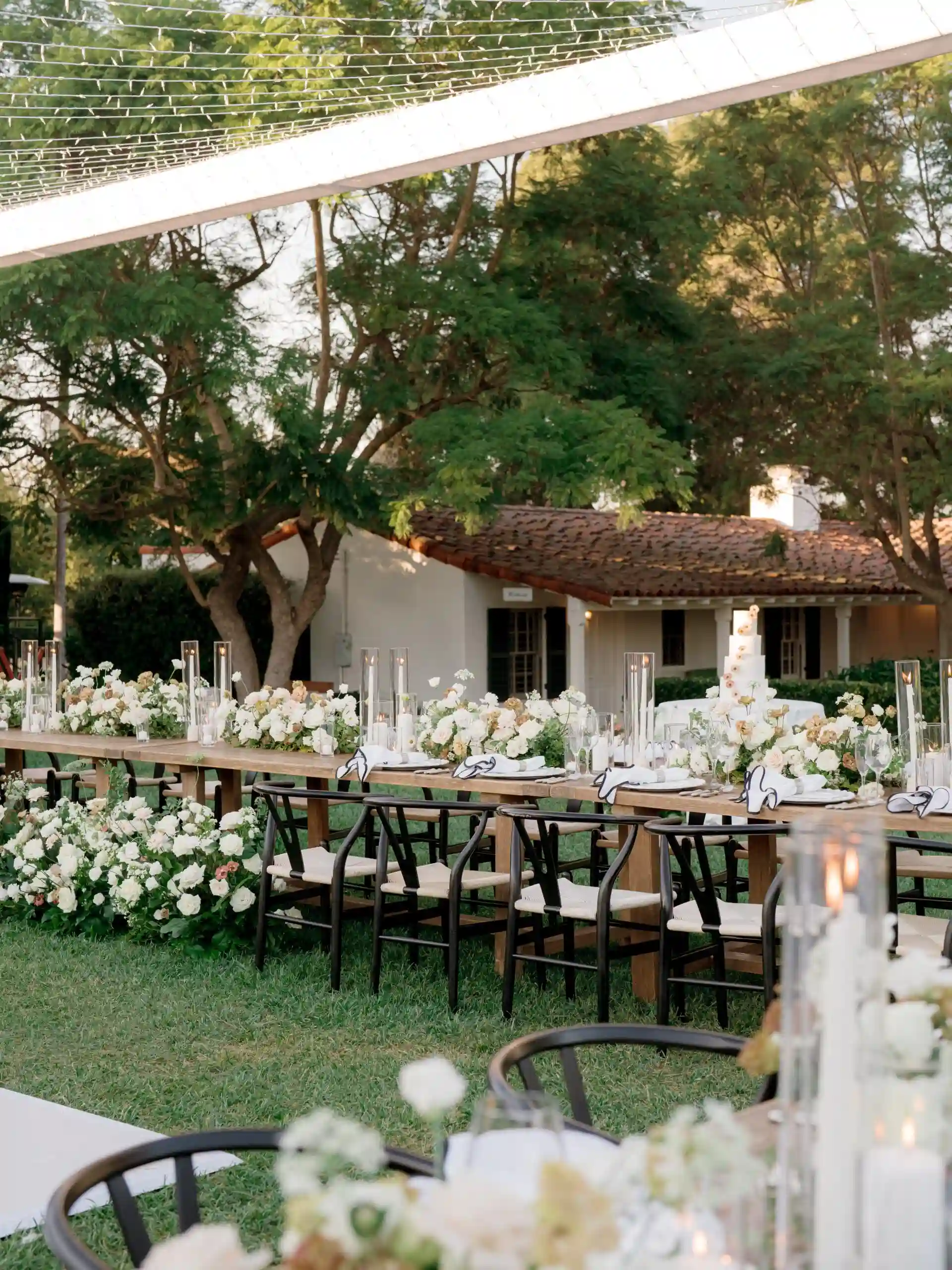 Garden with tables and floral decorations for a wedding at The Inn at Rancho Santa Fe