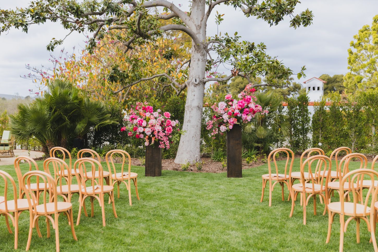 Rose lawn wedding ceremony setup.